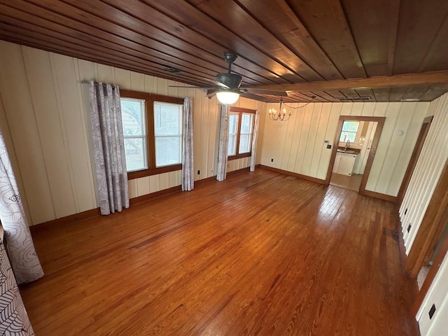 408 N Findlay St, Norman, OK 73071 - spare room featuring a chandelier, wood finished floors, healthy amount of natural light, wooden ceiling, and a sink