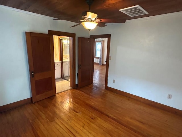 408 N Findlay St, Norman, OK 73071 - unfurnished room featuring baseboards, light wood-style flooring, and ceiling fan