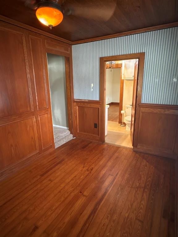 408 N Findlay St, Norman, OK 73071 - unfurnished room featuring wood finished floors and wood walls