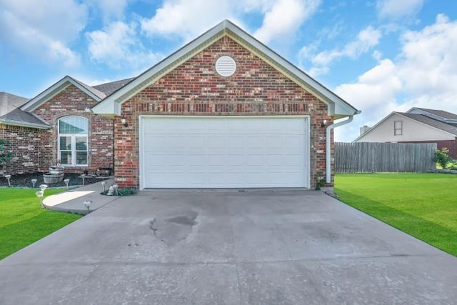 2 NW Havenshire Cir, Lawton, OK 73505 - view of front of property with brick siding, concrete driveway, and a garage