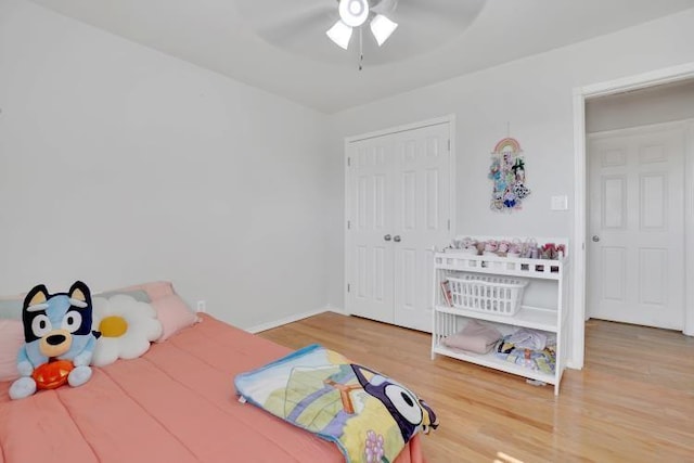2 NW Havenshire Cir, Lawton, OK 73505 - bedroom featuring wood finished floors, a closet, ceiling fan, and baseboards