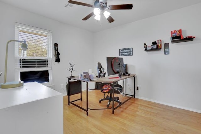 2 NW Havenshire Cir, Lawton, OK 73505 - office area featuring a ceiling fan, light wood-style flooring, and baseboards