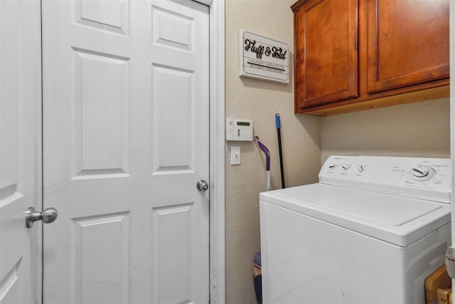 12329 SW 9th Ter, Yukon, OK 73099 - washroom with washer / clothes dryer and cabinet space