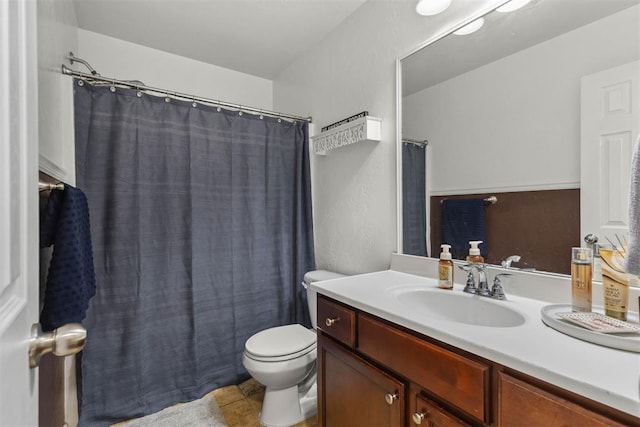 12329 SW 9th Ter, Yukon, OK 73099 - bathroom with vanity, toilet, and curtained shower
