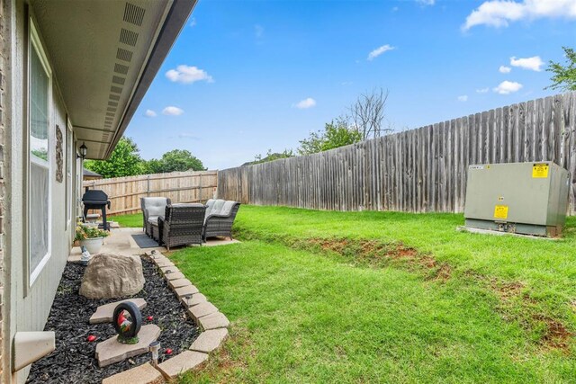 12329 SW 9th Ter, Yukon, OK 73099 - view of yard with a patio and an outdoor hangout area