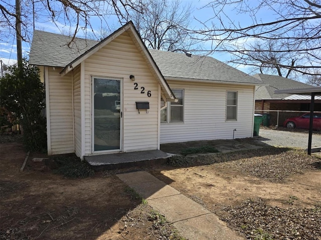 226 E Iowa St, Walters, OK 73572 - view of front of house featuring roof with shingles