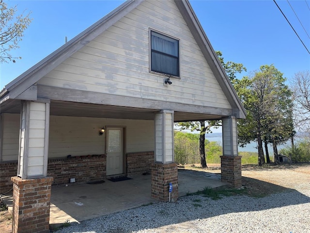 216 N Bk 1600 Rd, Stigler, OK 74462 - view of property exterior with brick siding