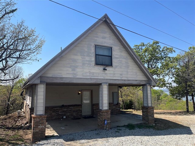 216 N Bk 1600 Rd, Stigler, OK 74462 - view of front of home with brick siding