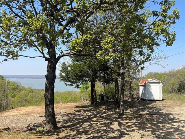 216 N Bk 1600 Rd, Stigler, OK 74462 - view of yard with a wooded view