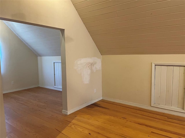216 N Bk 1600 Rd, Stigler, OK 74462 - additional living space featuring vaulted ceiling, light wood-style flooring, baseboards, and wood ceiling