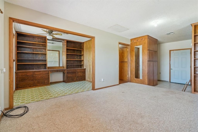 1317 S 58th St, Duncan, OK 73534 - unfurnished bedroom featuring carpet floors, baseboards, and a textured ceiling