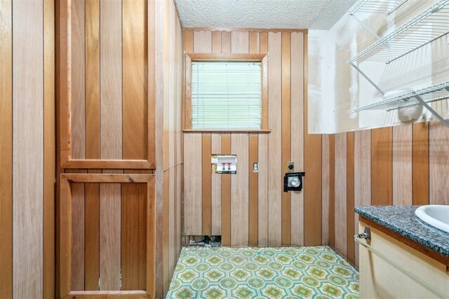 1317 S 58th St, Duncan, OK 73534 - bathroom with vanity and a textured ceiling
