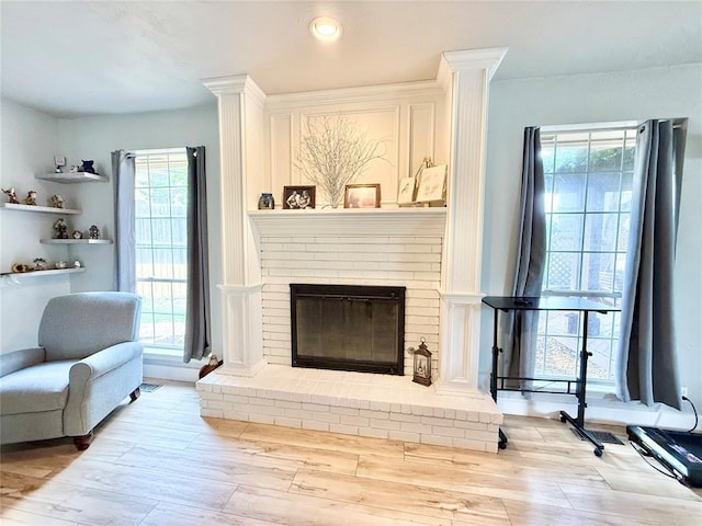 9977 Birkenhead Ct, Yukon, OK 73099 - living room with wood finished floors and a fireplace