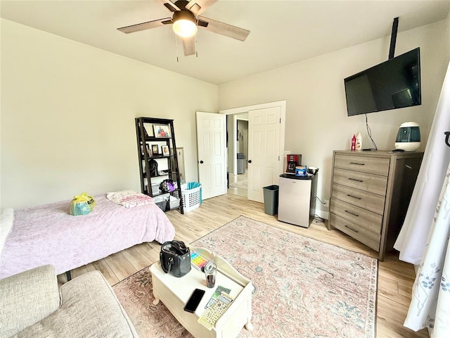 9977 Birkenhead Ct, Yukon, OK 73099 - bedroom featuring light wood finished floors and ceiling fan