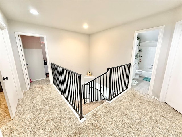 9977 Birkenhead Ct, Yukon, OK 73099 - hall featuring an upstairs landing, carpet floors, and recessed lighting