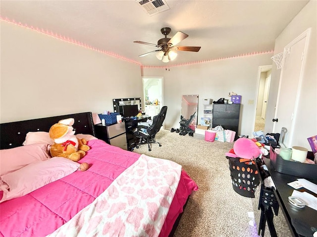 9977 Birkenhead Ct, Yukon, OK 73099 - bedroom with carpet floors and ceiling fan