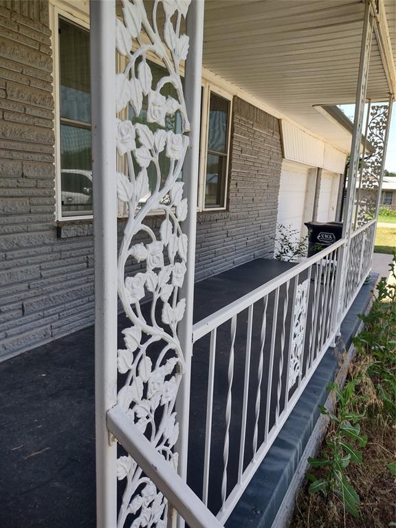 206 6th St, Verden, OK 73092 - property entrance with brick siding