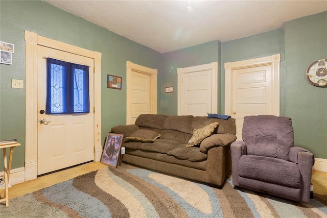 320 W Forest Ave, Eufaula, OK 74432 - living room featuring carpet floors and baseboards