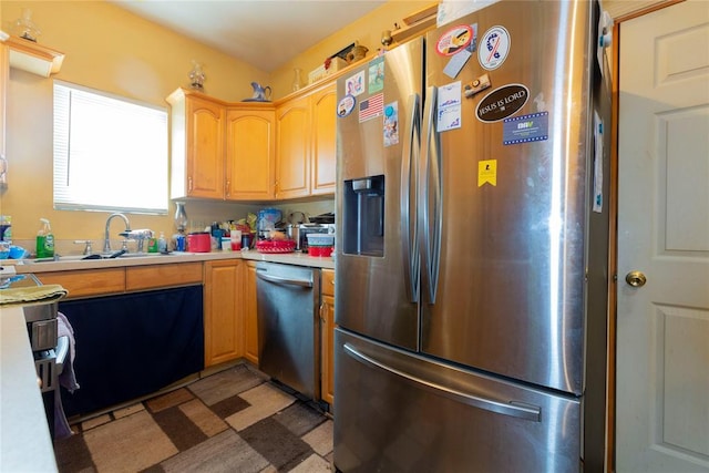 320 W Forest Ave, Eufaula, OK 74432 - kitchen with stainless steel appliances, light countertops, and a sink