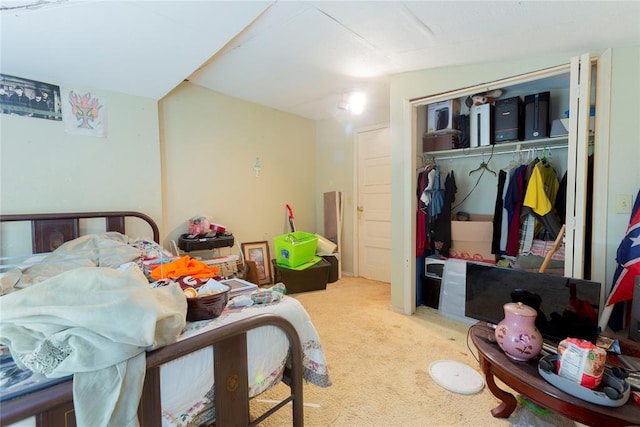 320 W Forest Ave, Eufaula, OK 74432 - bedroom featuring carpet floors and a closet