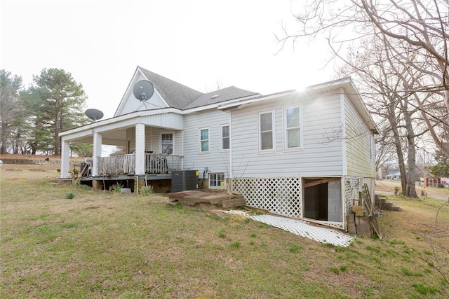 320 W Forest Ave, Eufaula, OK 74432 - back of house with a porch, a yard, and central AC