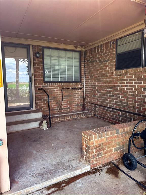 10190 County Road 1310, Fort Cobb, OK 73038 - view of patio featuring entry steps