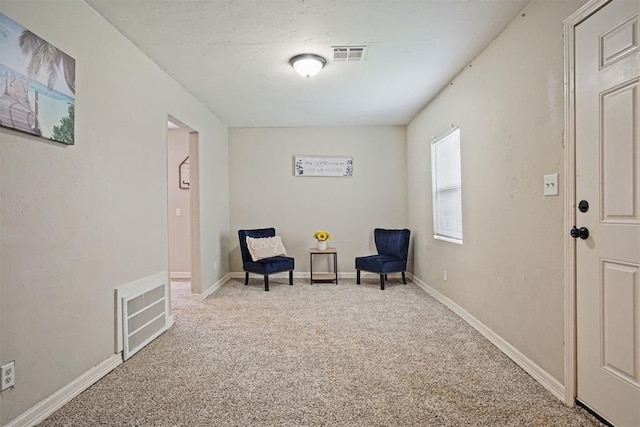 940 NE 32nd St, Oklahoma City, OK 73105 - sitting room with carpet and baseboards