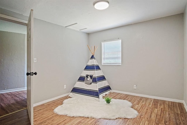 940 NE 32nd St, Oklahoma City, OK 73105 - recreation room featuring wood finished floors