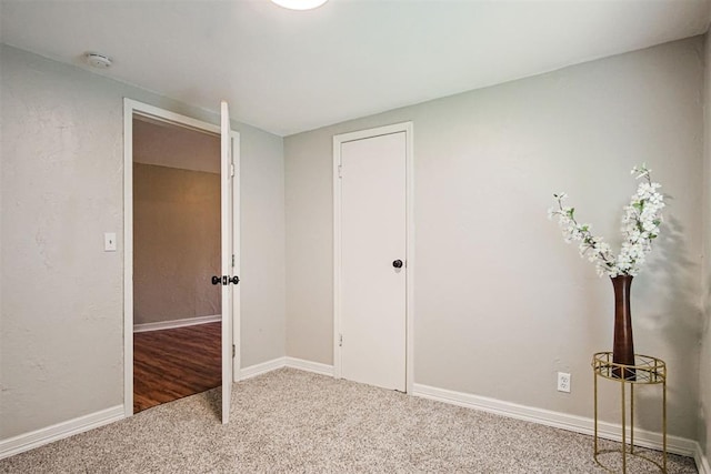 940 NE 32nd St, Oklahoma City, OK 73105 - unfurnished bedroom featuring carpet floors and baseboards