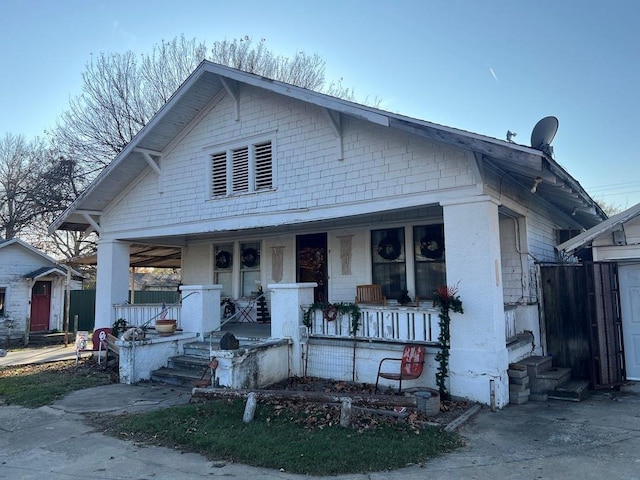 325 N 5th St, Okemah, OK 74859 - view of front of house featuring covered porch