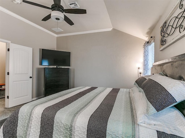 2617 Snapper Ln, Oklahoma City, OK 73130 - carpeted bedroom with vaulted ceiling, a ceiling fan, and ornamental molding