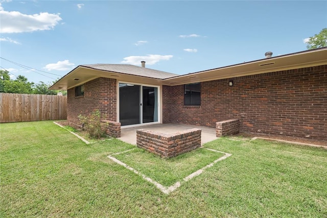 4328 NW 12th St, Oklahoma City, OK 73107 - rear view of property featuring brick siding and a patio