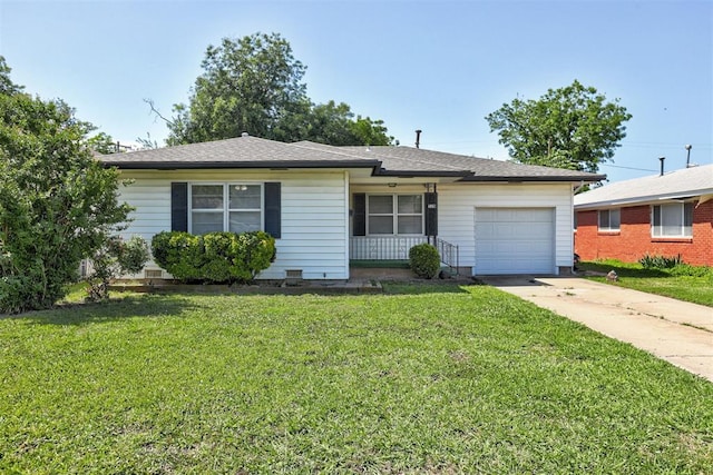 520 SE 47th St, Oklahoma City, OK 73129 - single story home featuring a garage, a front yard, concrete driveway, and covered porch