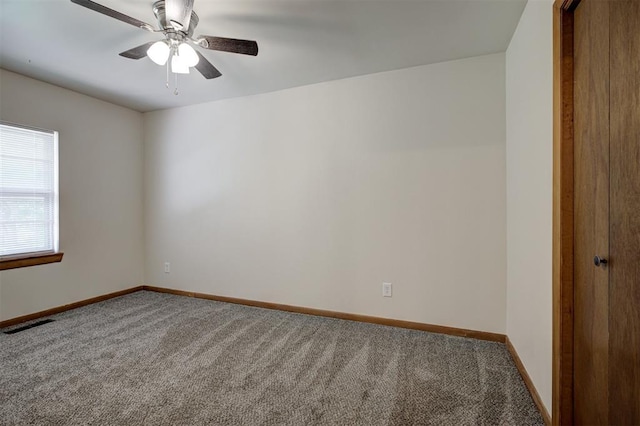 520 SE 47th St, Oklahoma City, OK 73129 - unfurnished room with carpet, baseboards, and a ceiling fan