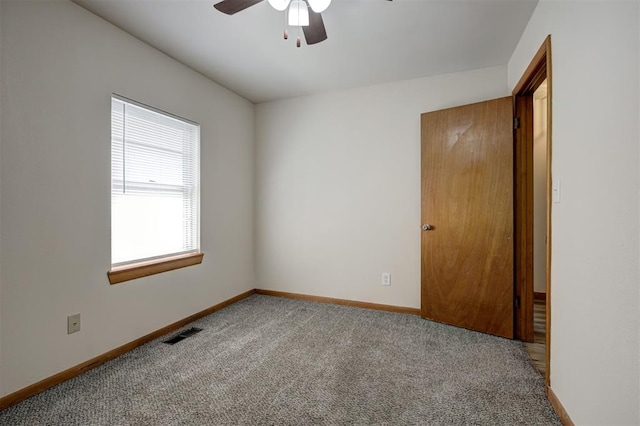 520 SE 47th St, Oklahoma City, OK 73129 - carpeted spare room featuring a ceiling fan and baseboards