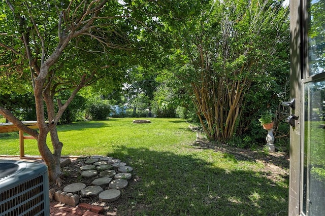 520 SE 47th St, Oklahoma City, OK 73129 - view of grassy yard with cooling unit