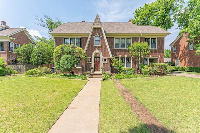 1527 NW 35th St, Oklahoma City, OK 73118 - tudor home featuring brick siding and a chimney