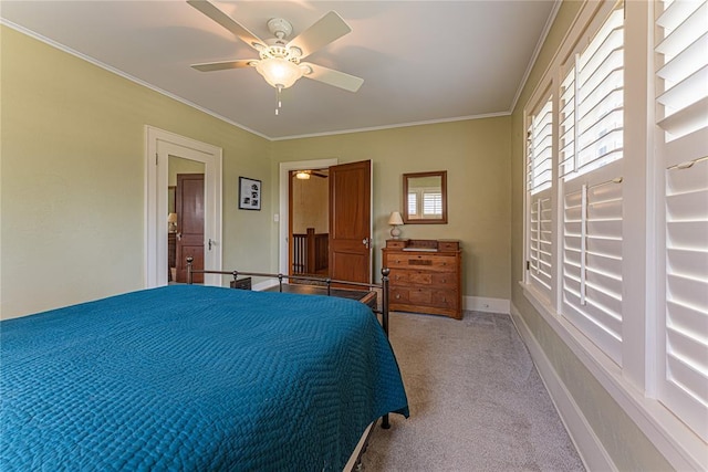 1527 NW 35th St, Oklahoma City, OK 73118 - carpeted bedroom with crown molding, a ceiling fan, and baseboards