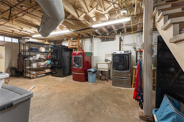1527 NW 35th St, Oklahoma City, OK 73118 - basement with freestanding refrigerator, separate washer and dryer, and a sink