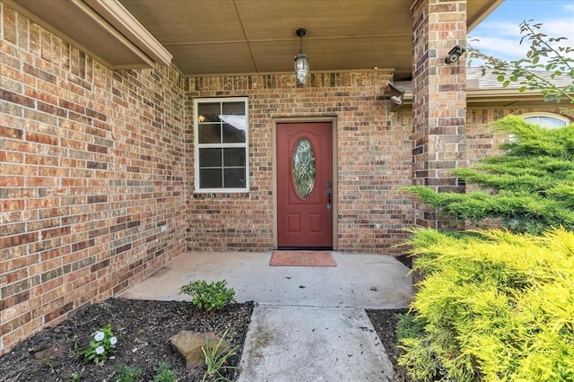 104 Southpointe Ave, Tuttle, OK 73089 - view of exterior entry with brick siding