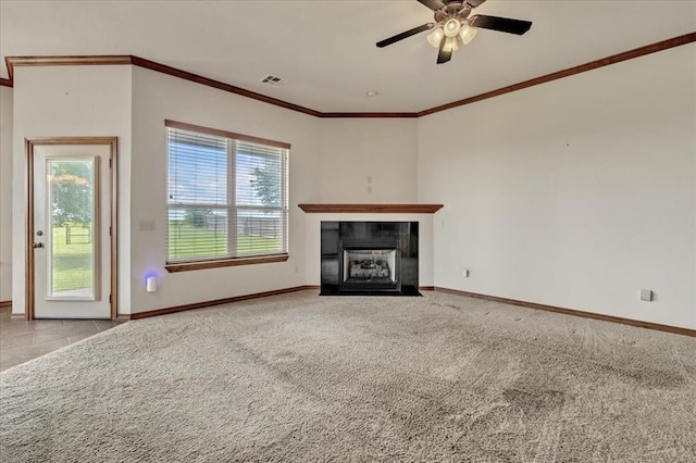 104 Southpointe Ave, Tuttle, OK 73089 - unfurnished living room with a fireplace, baseboards, ornamental molding, a ceiling fan, and carpet floors