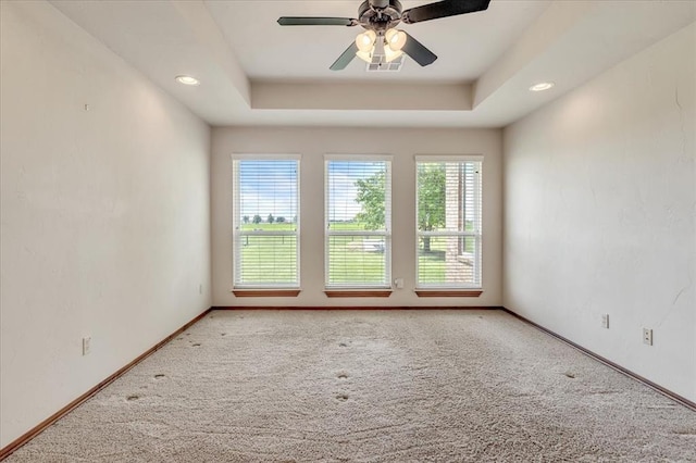 104 Southpointe Ave, Tuttle, OK 73089 - empty room with carpet, baseboards, a tray ceiling, ceiling fan, and recessed lighting