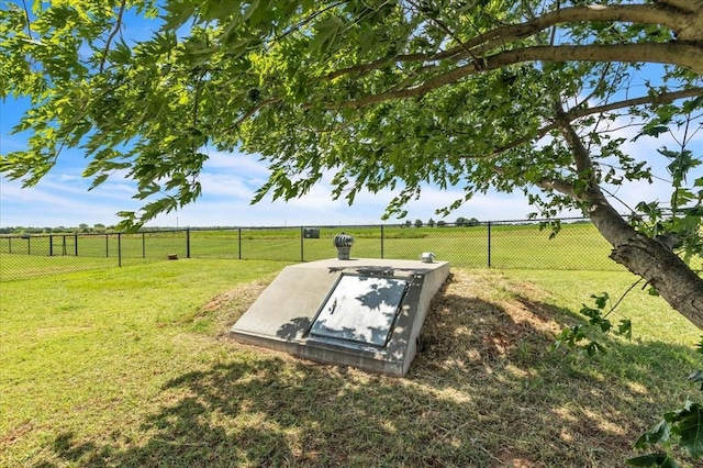104 Southpointe Ave, Tuttle, OK 73089 - entry to storm shelter with a view of countryside