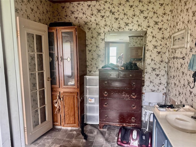 19350 8 A St, Norman, OK 73026 - bathroom featuring wallpapered walls and vanity