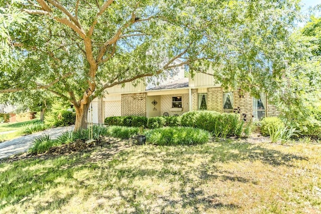 829 Douglas Dr, Norman, OK 73069 - view of front of house with brick siding