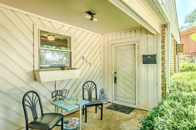 829 Douglas Dr, Norman, OK 73069 - property entrance with board and batten siding
