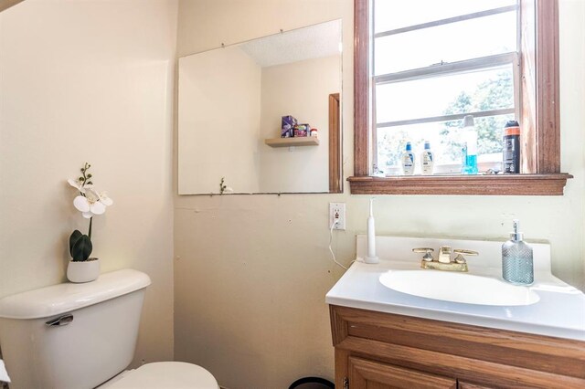 829 Douglas Dr, Norman, OK 73069 - half bath featuring toilet and vanity