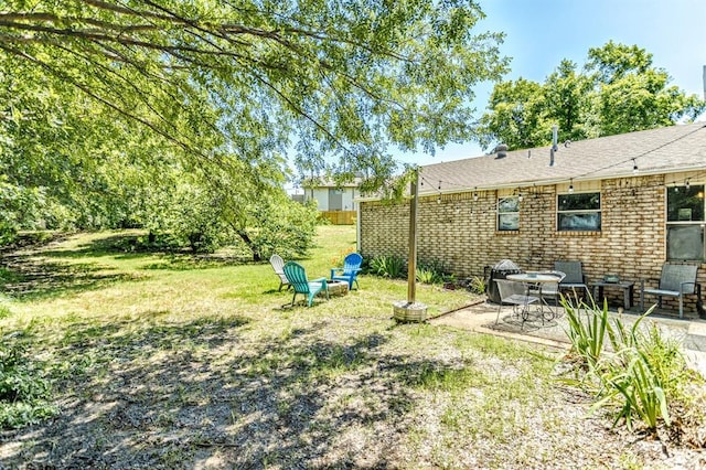 829 Douglas Dr, Norman, OK 73069 - view of grassy yard with a patio