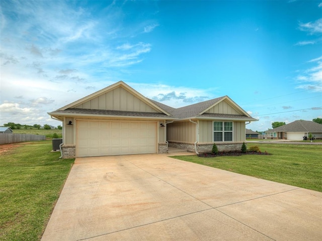 1940 Eli Ave, Tuttle, OK 73089 - view of front facade with brick siding, an attached garage, board and batten siding, driveway, and cooling unit