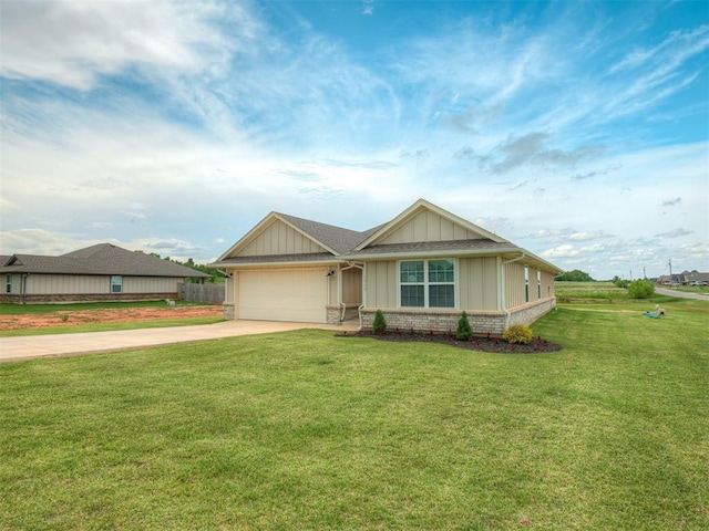 1940 Eli Ave, Tuttle, OK 73089 - view of front of home with concrete driveway, an attached garage, board and batten siding, and a front lawn